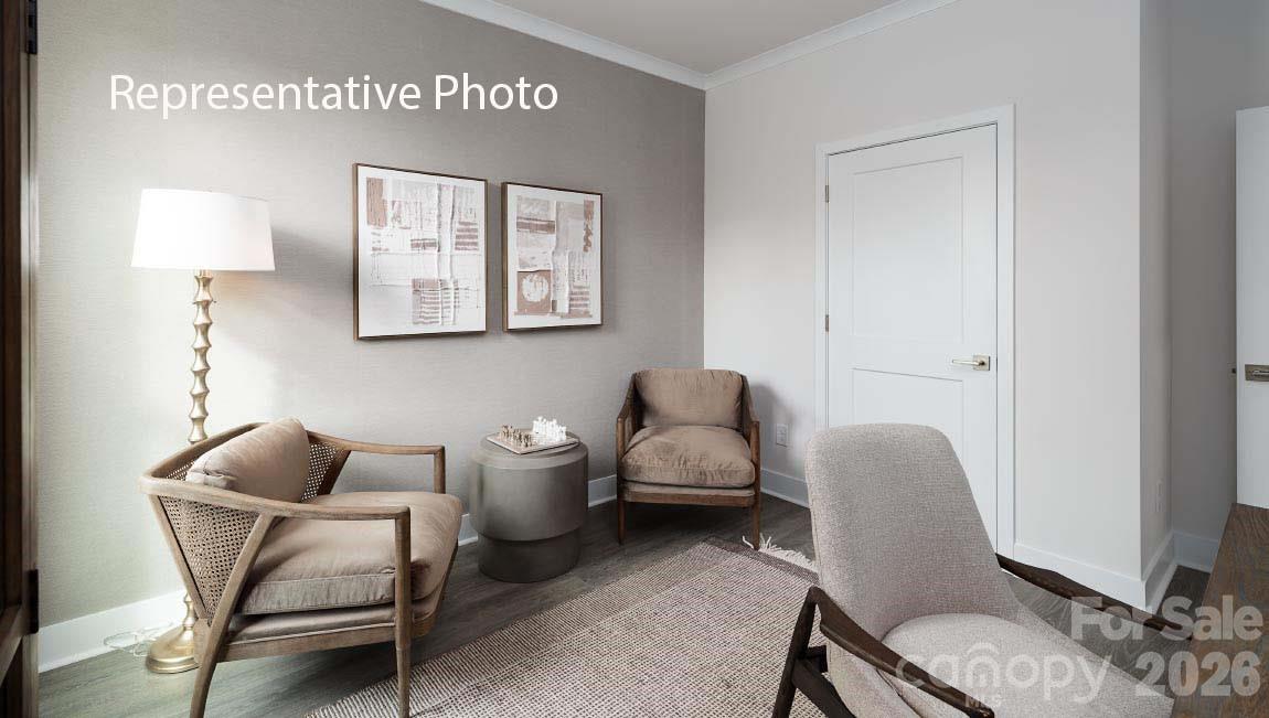 4139 Round Table Drive Gastonia, NC 28056 - Photo 22 of 24 a living room with furniture and a chair