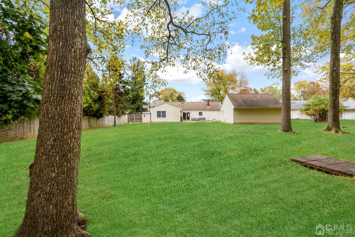 38 Homestead Road Edison, NJ 08820 - Photo 2 of 15 a view of a garden with a tree