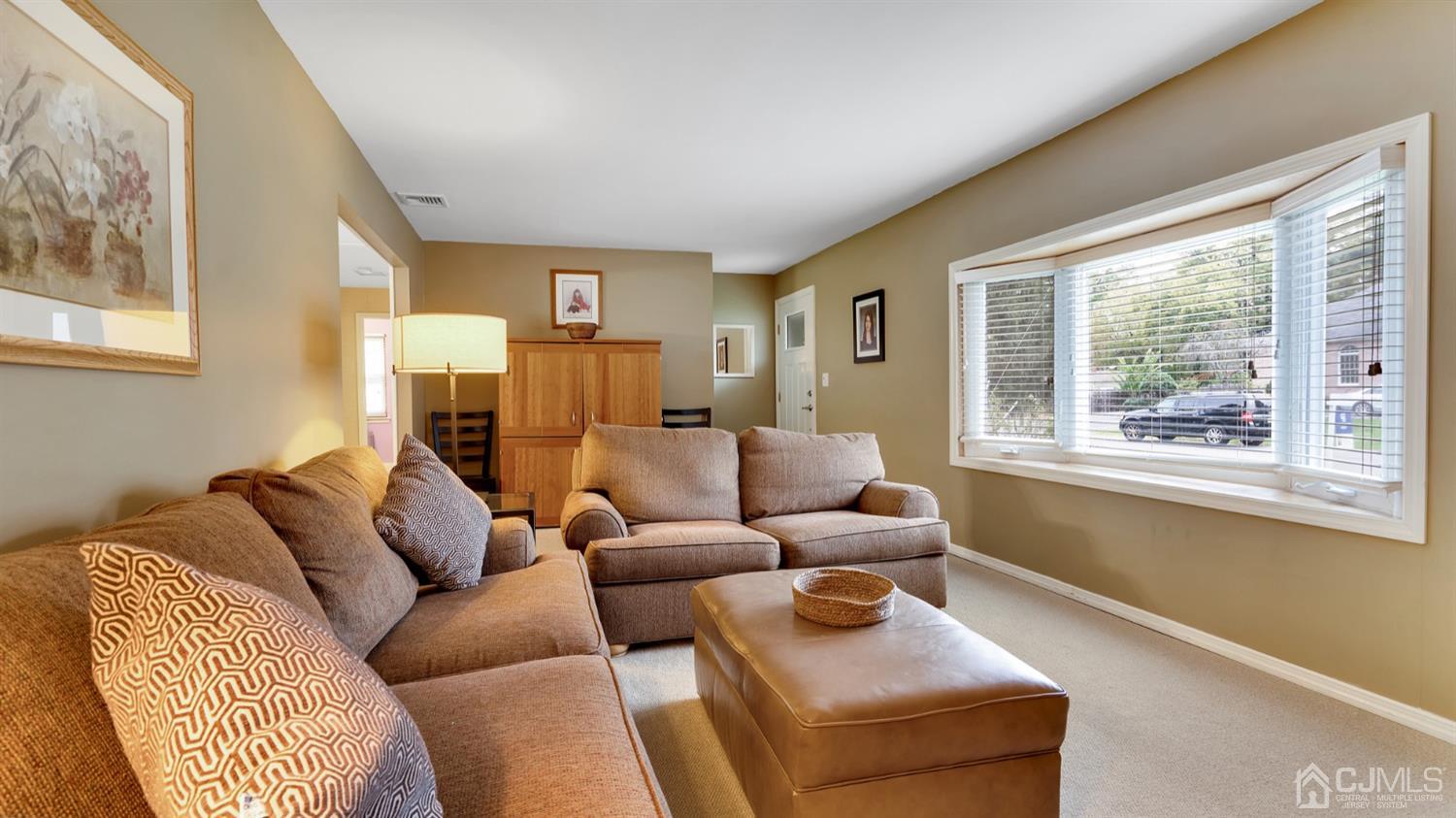 38 Homestead Road Edison, NJ 08820 - Photo 7 of 15 a living room with furniture and a window