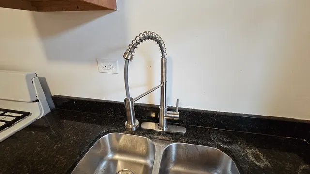 a room with furniture and a wooden floor