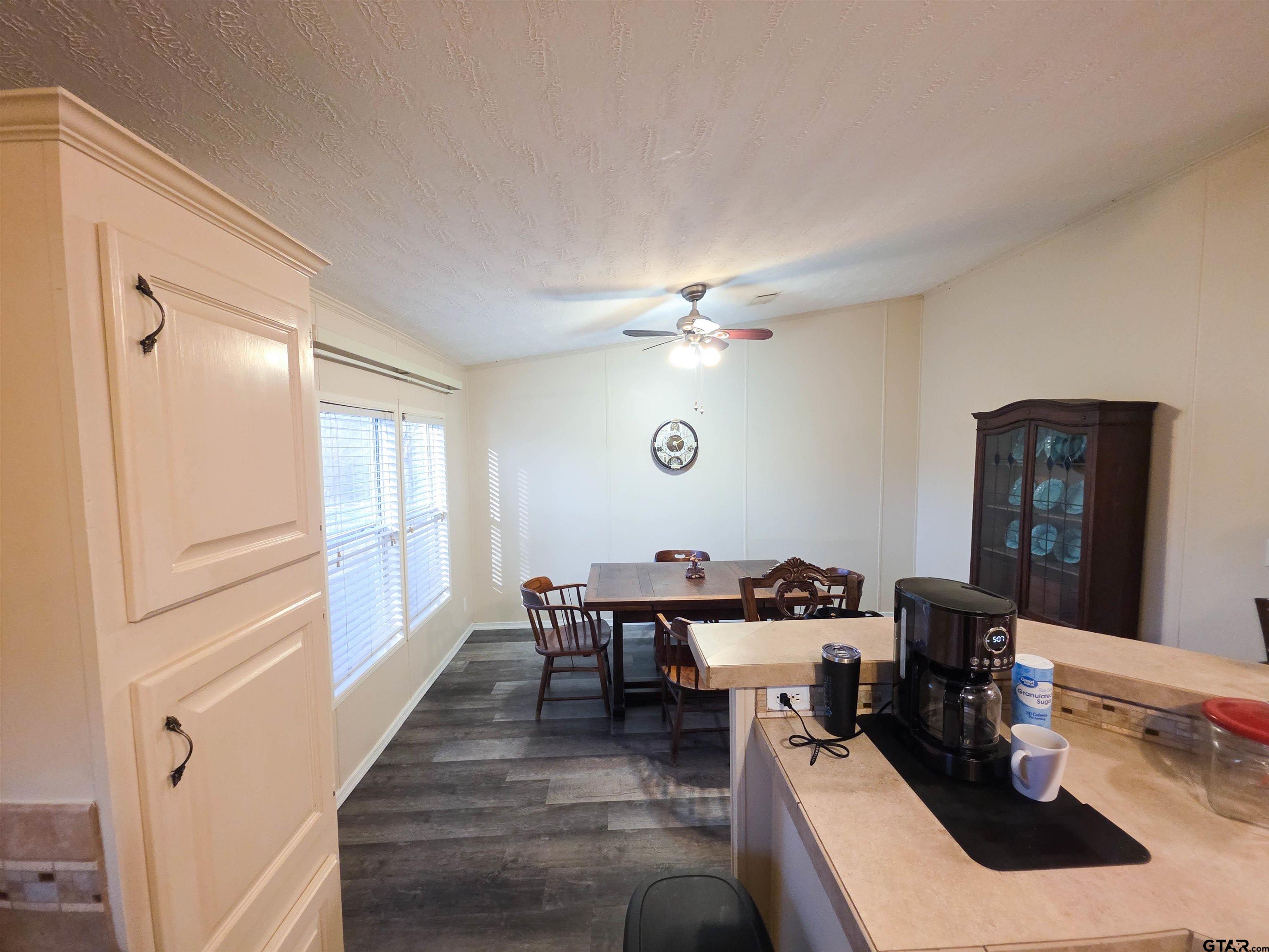 12507 Dingler Road Tyler, TX 75709 - Photo 16 of 26 a dining room with furniture and window