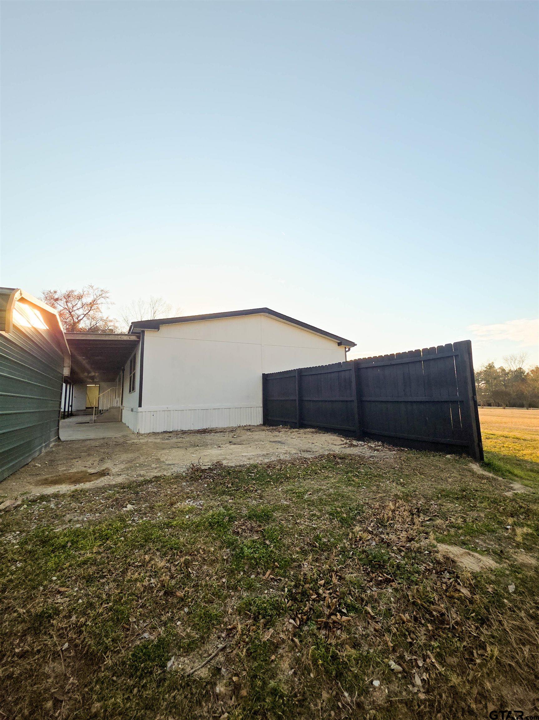 12507 Dingler Road Tyler, TX 75709 - Photo 5 of 26 a view of a backyard