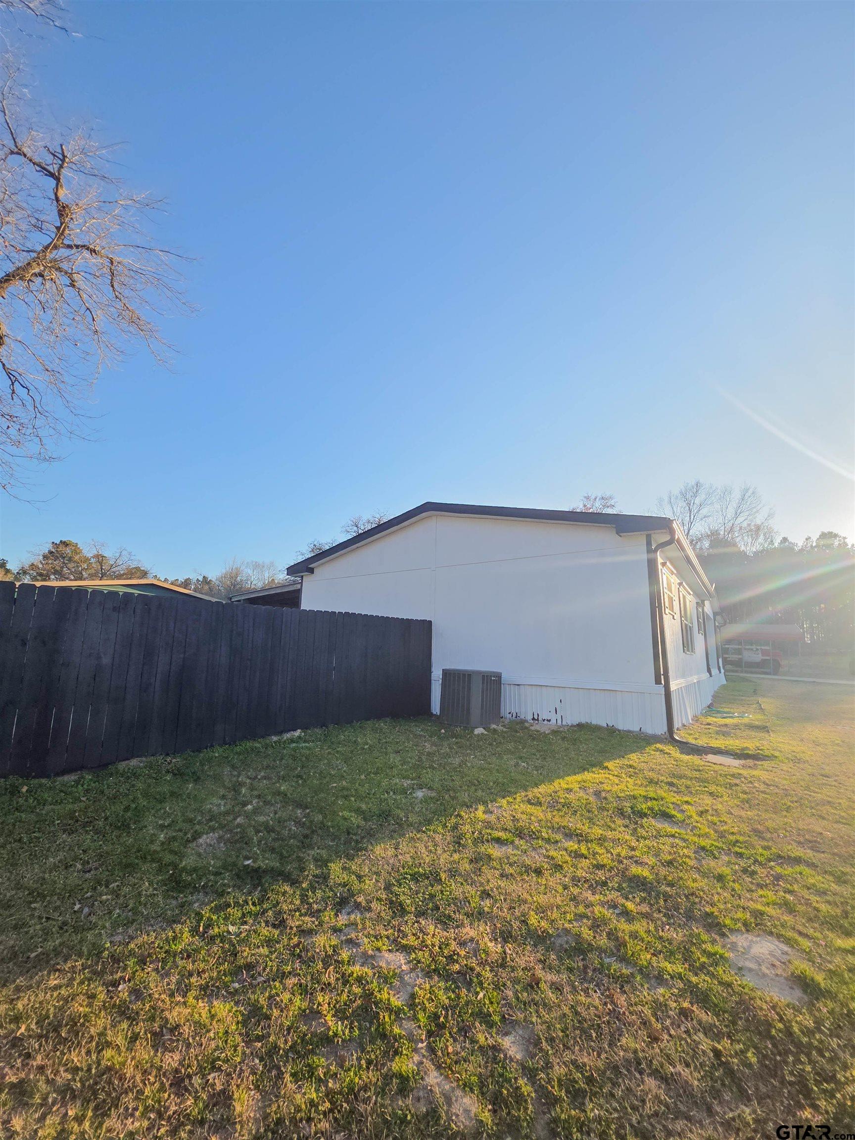 12507 Dingler Road Tyler, TX 75709 - Photo 6 of 26 a view of a backyard