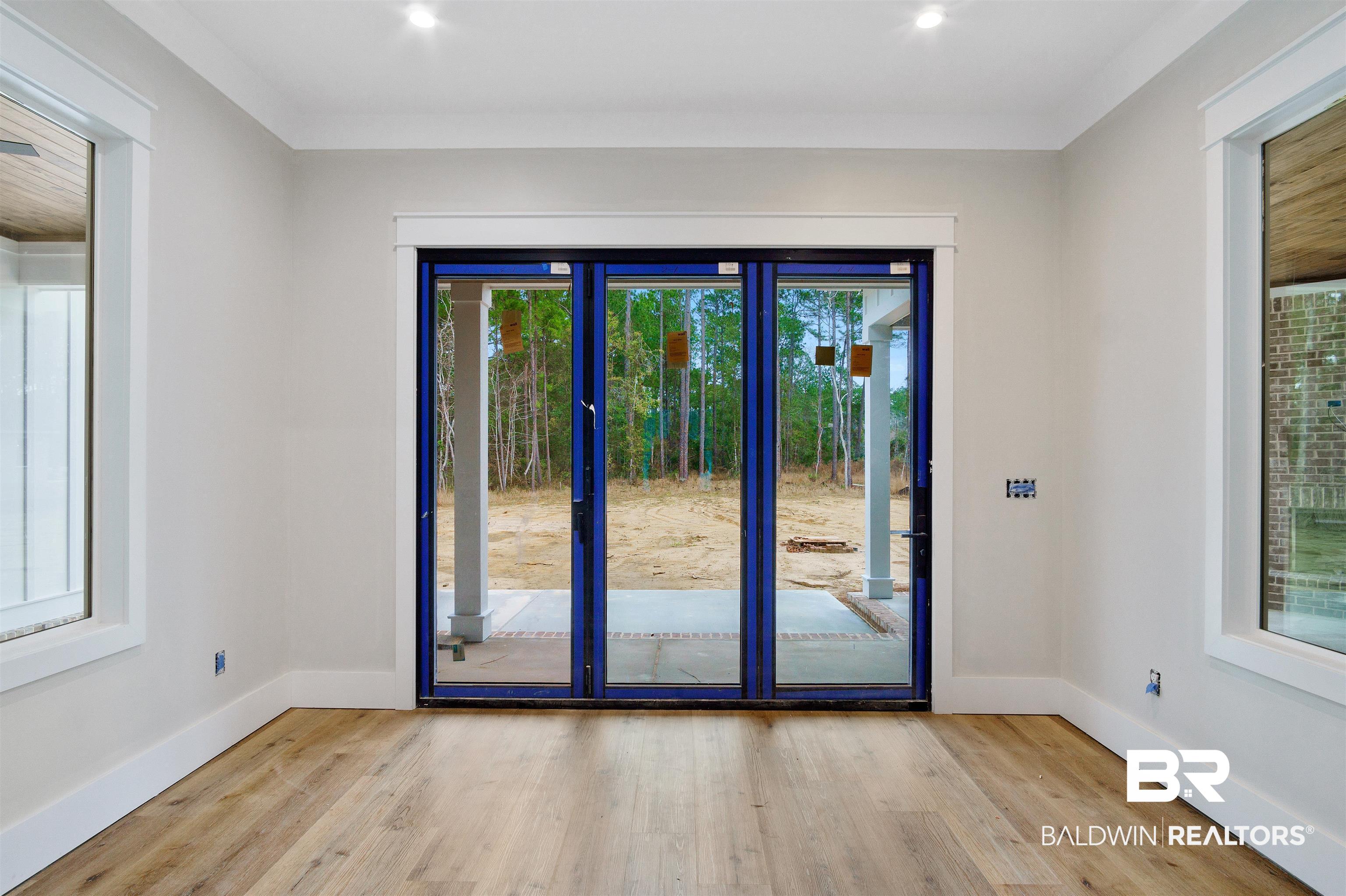 5374 Millhouse Road Gulf Shores, AL 36542 - Photo 11 of 41 with multi panel folding door