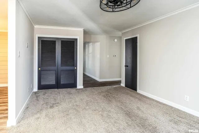 a view of an empty room and window