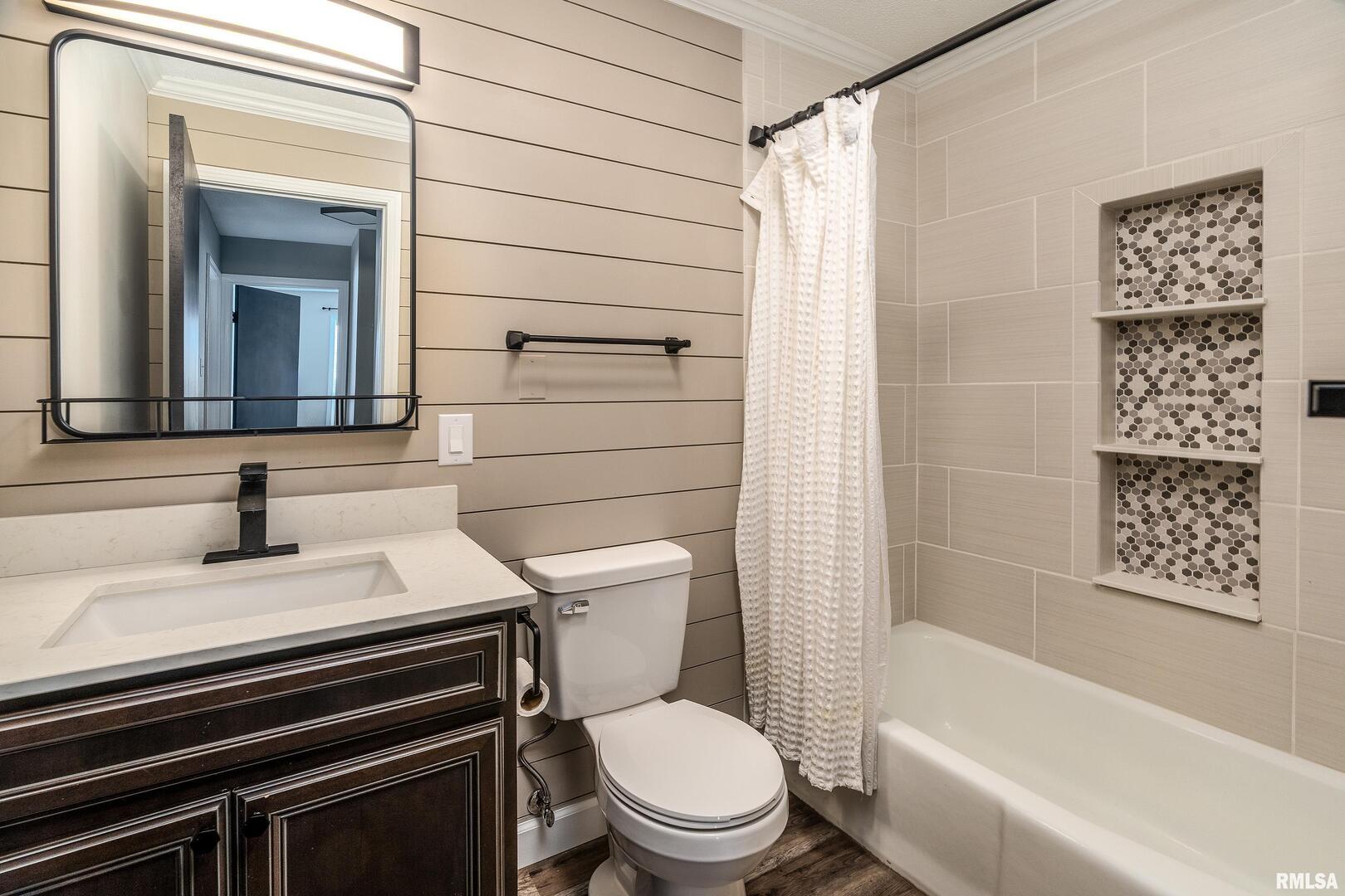 203 Fairway Vista Road Murphysboro, IL 62966 - Photo 28 of 44 a bathroom with a sink a toilet and shower