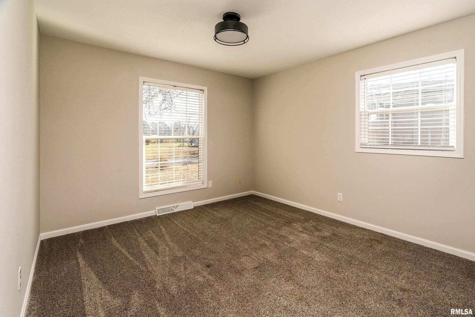 203 Fairway Vista Road Murphysboro, IL 62966 - Photo 31 of 44 a view of an empty room with a window