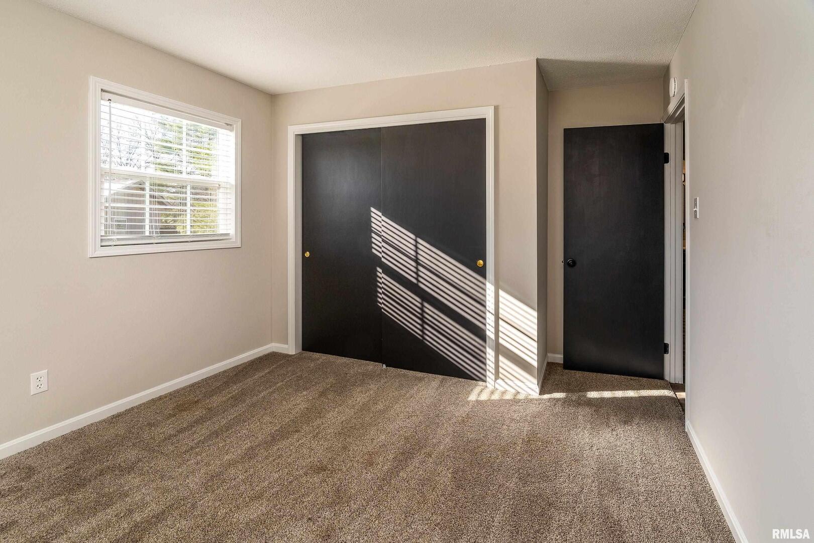 203 Fairway Vista Road Murphysboro, IL 62966 - Photo 32 of 44 a view of an empty room with a window