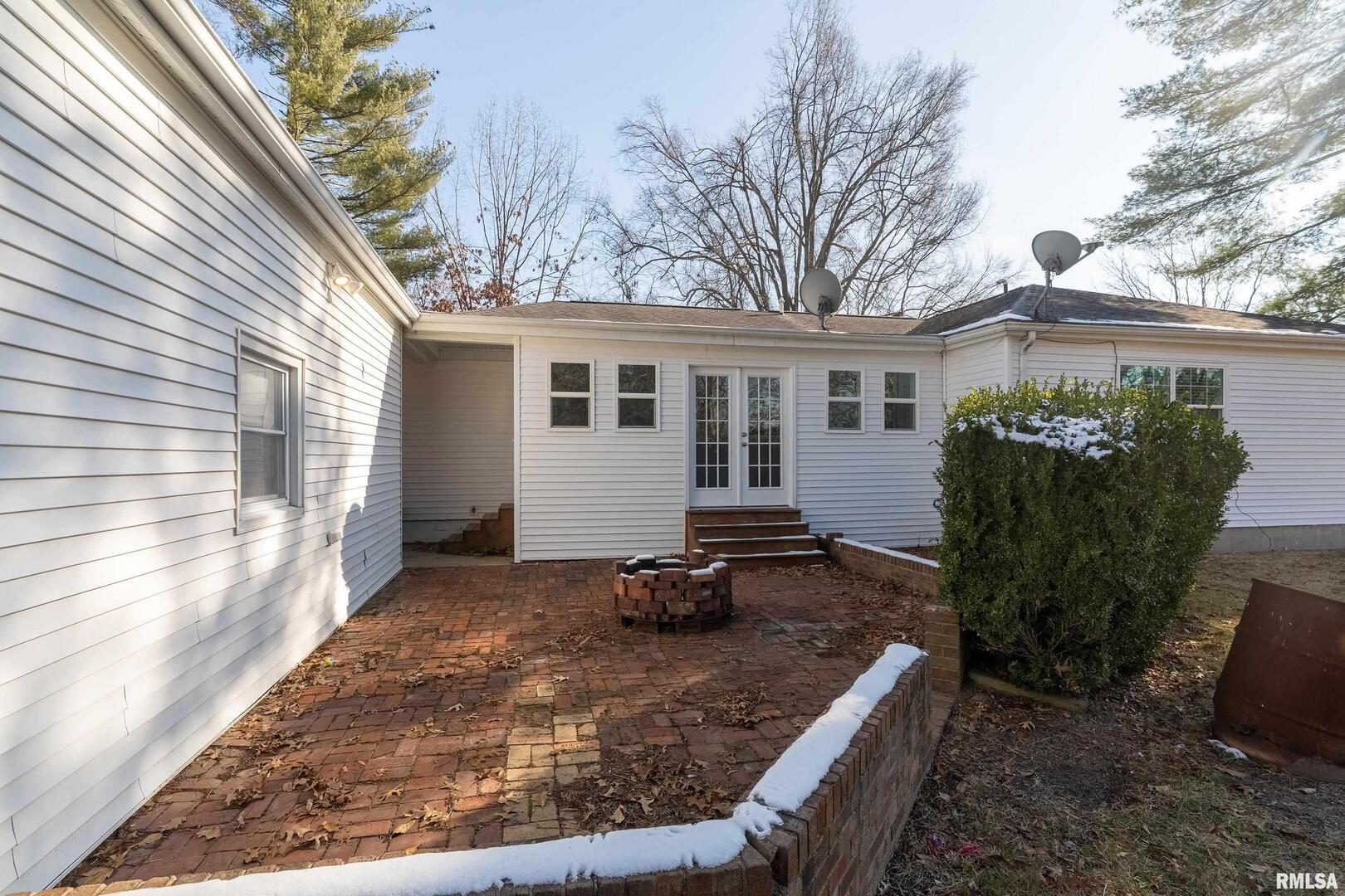 203 Fairway Vista Road Murphysboro, IL 62966 - Photo 37 of 44 a view of a house with backyard and sitting area