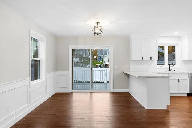 a bathroom with a double vanity sink and mirror