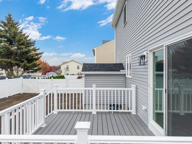 a view of balcony with wooden floor