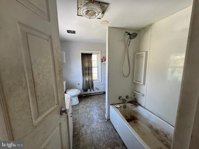 9440 Hollow Road Middletown, MD 21769 - Photo 14 of 20 a bathroom with a tub a toilet and a shower
