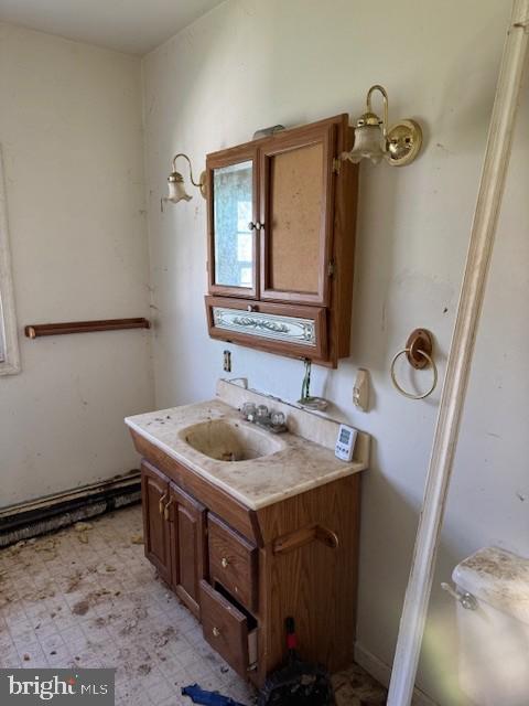 9440 Hollow Road Middletown, MD 21769 - Photo 9 of 20 a bathroom with a sink and a mirror