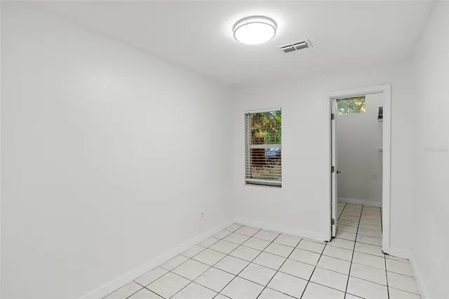 an empty room with windows