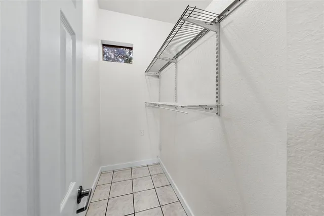 a view of an empty walk in closet