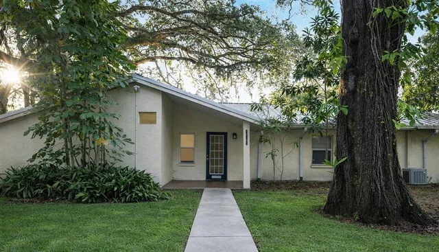 a view of a back yard of the house