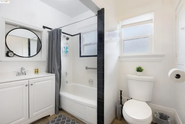 a bathroom with a toilet a sink and a bathtub
