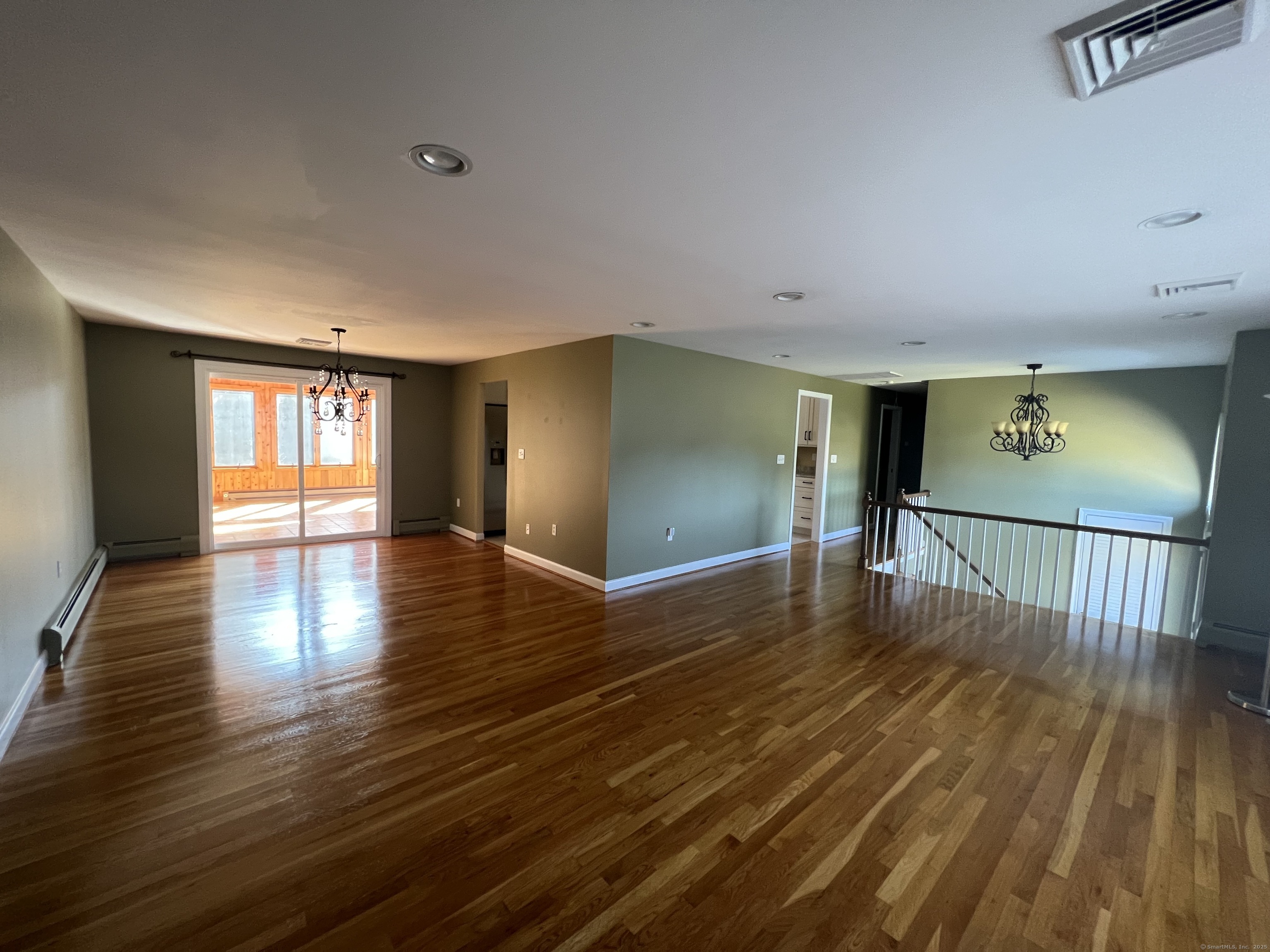 104 Willow Street Wethersfield, CT 06109 - Photo 9 of 28 a view of empty room with wooden floor