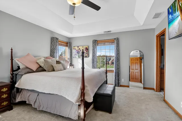 a bed room with a bed and a window