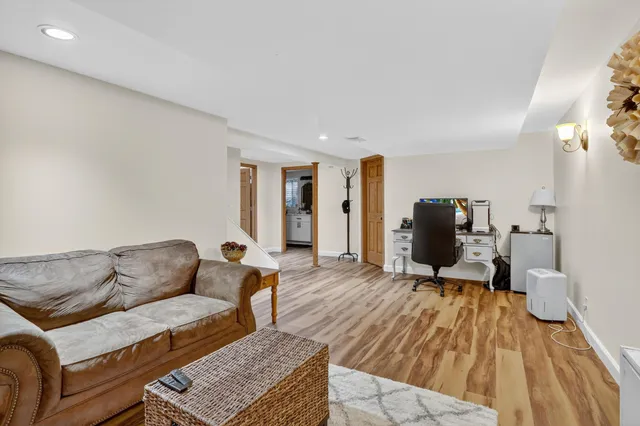 a living room with furniture and a couch