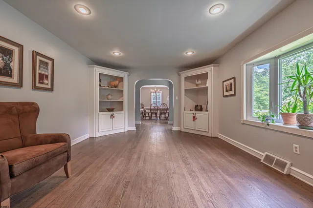 a view of livingroom with furniture wooden floor and window