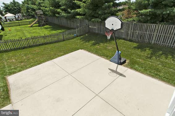 5923 Clear Ridge Road Elkridge, MD 21075 - Photo 22 of 30 Rear patio an basketball court
