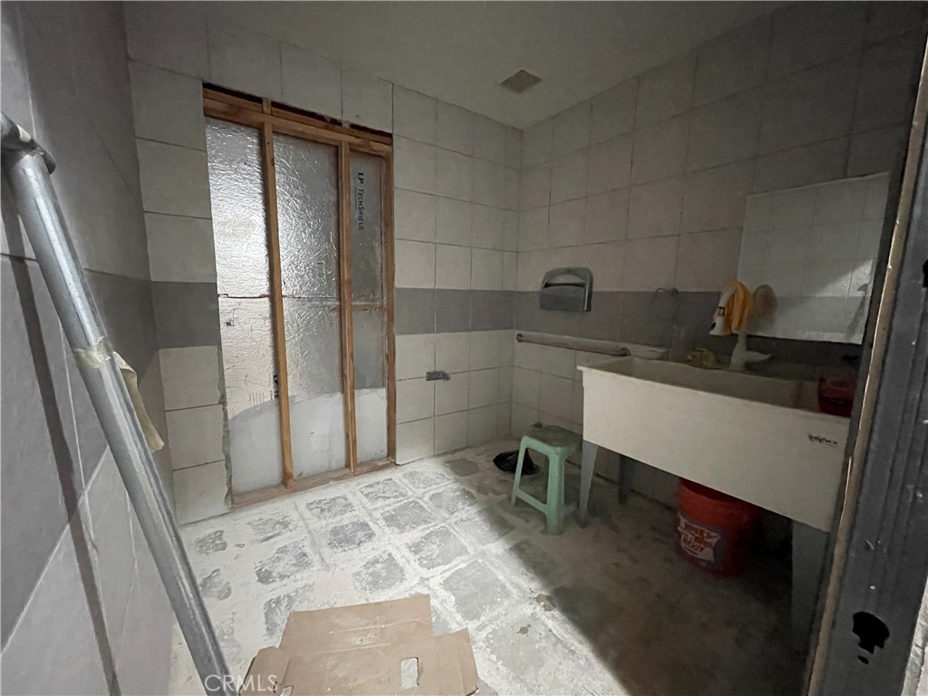 1212 West Commonwealth Avenue Fullerton, CA 92833 - Photo 11 of 14 a room with a sink and cabinets