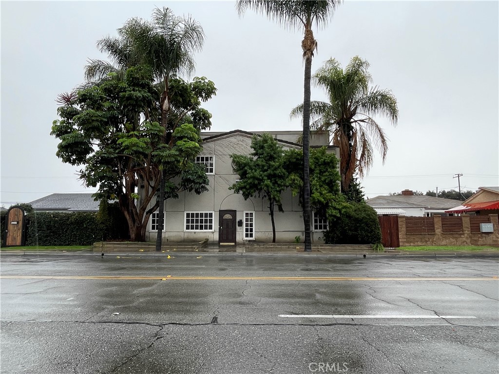 1212 West Commonwealth Avenue Fullerton, CA 92833 - Photo 2 of 14 a house with palm tree in front of it