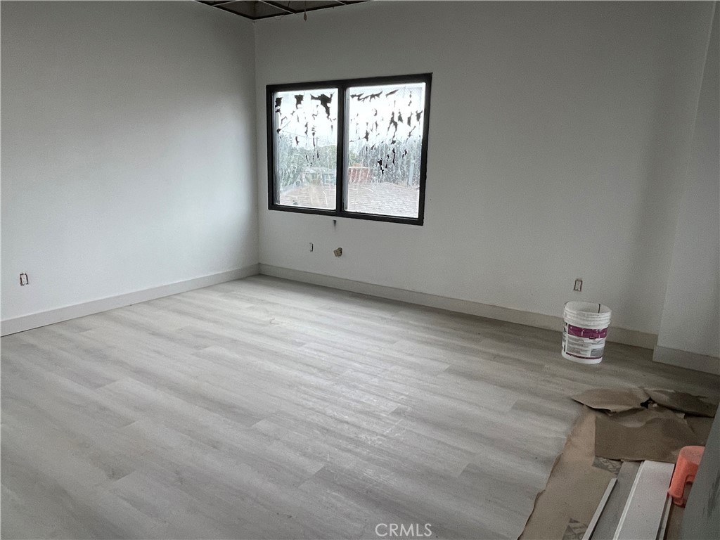 1212 West Commonwealth Avenue Fullerton, CA 92833 - Photo 5 of 14 a view of empty room with wooden floor