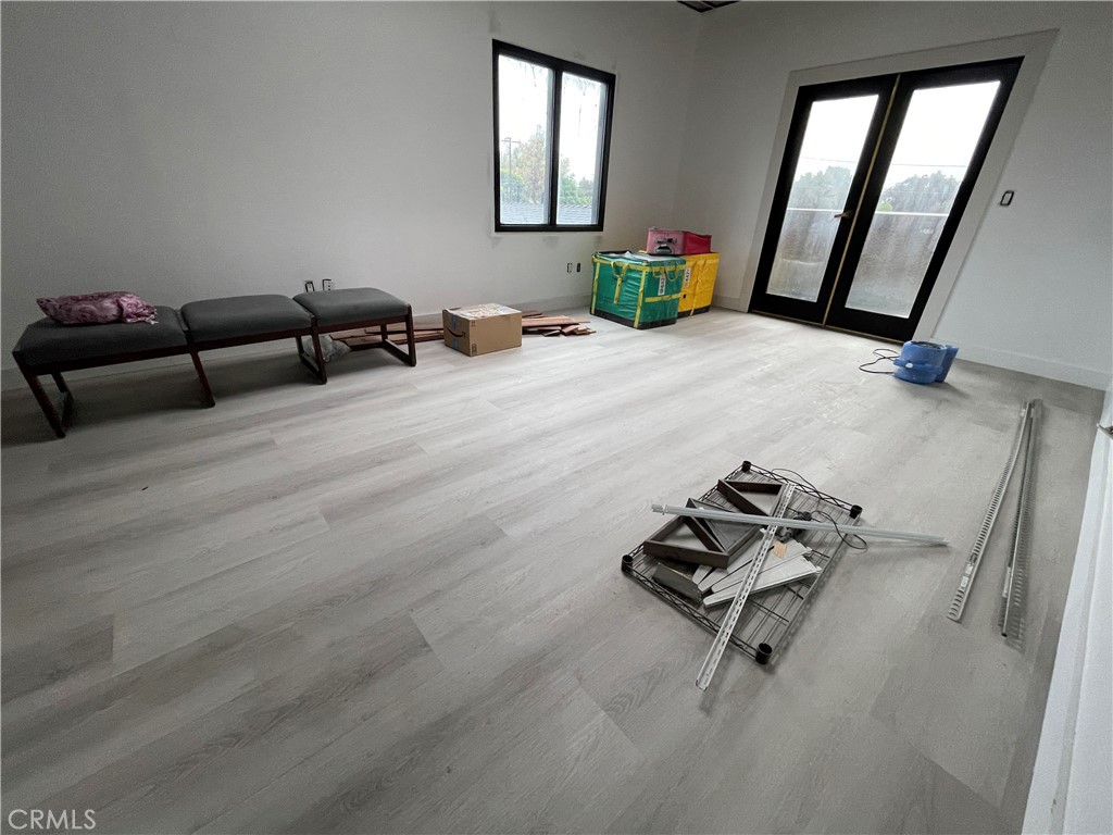 1212 West Commonwealth Avenue Fullerton, CA 92833 - Photo 8 of 14 a living room with furniture and a wooden floor