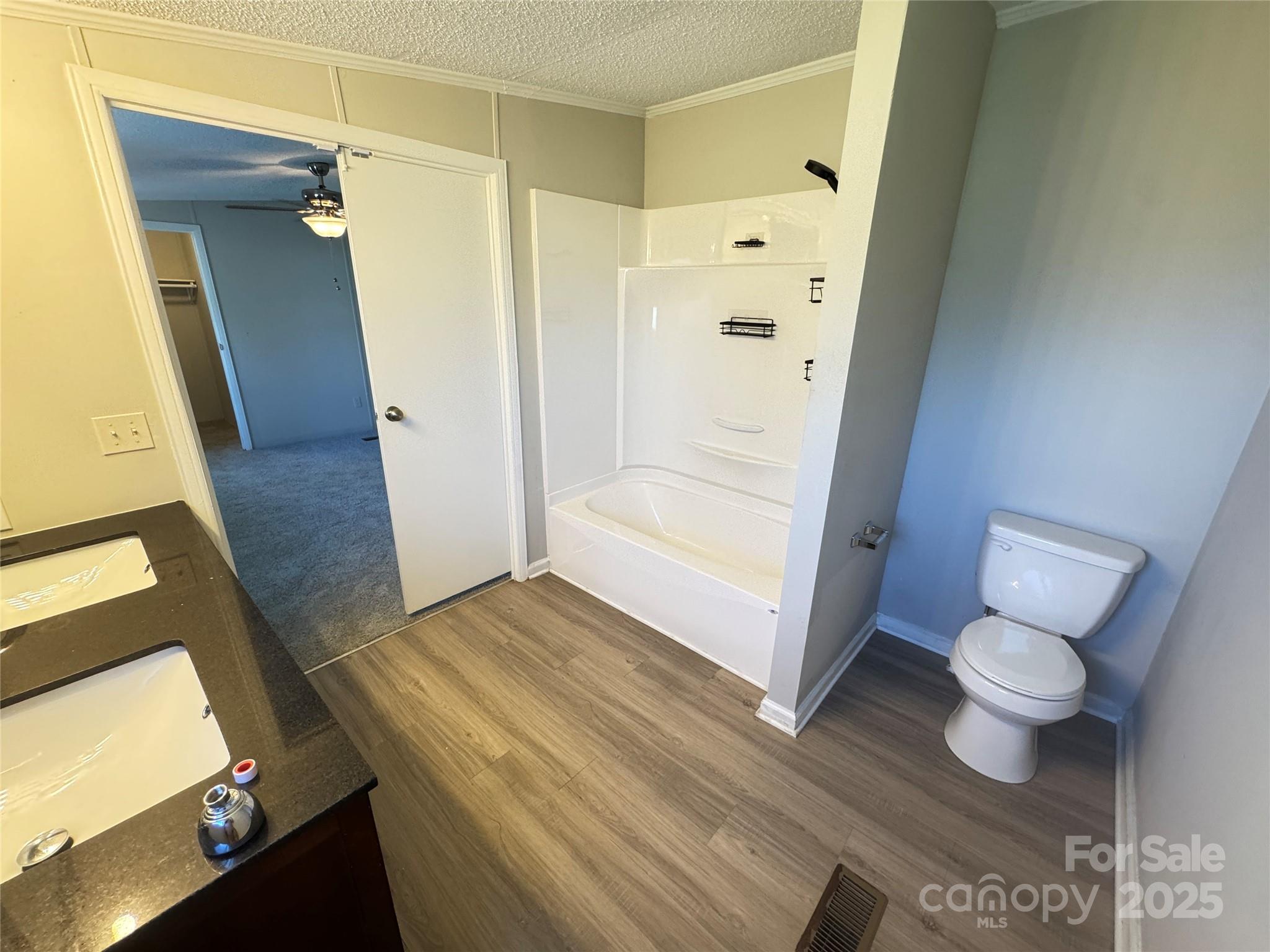 406 West Mill Street Landis, NC 28088 - Photo 15 of 20 a bathroom with a sink and a mirror