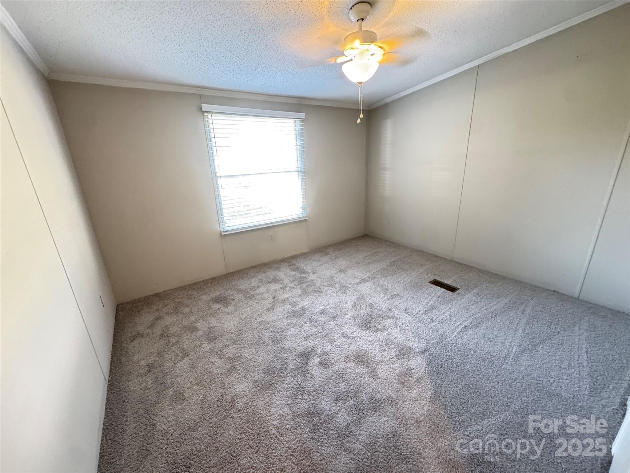 406 West Mill Street Landis, NC 28088 - Photo 20 of 20 an empty room with a window