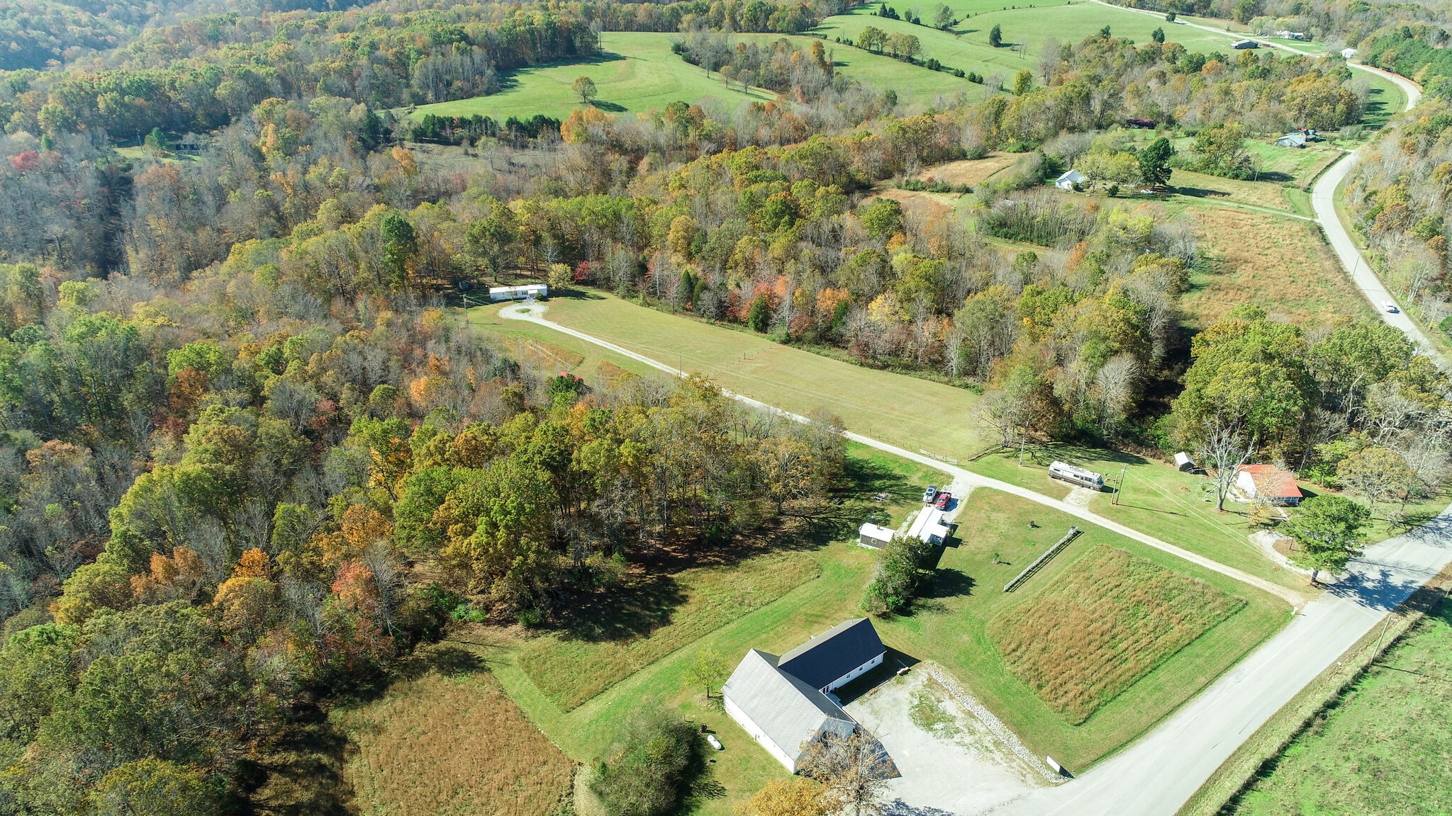 7602 Pewitt Road Franklin, TN 37064 - Photo 4 of 18 an aerial view of a residential houses with outdoor space and trees