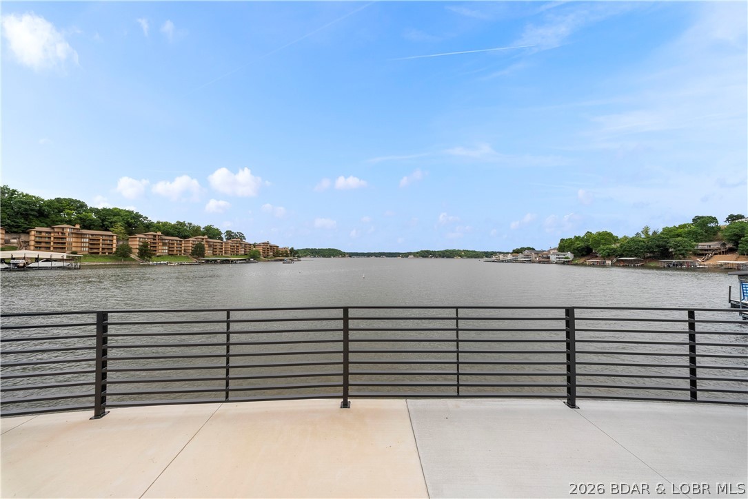 439 Red Bud Road Lake Ozark, MO 65049 - Photo 6 of 98 Spacious lakeside terrace offering unobstructed vi