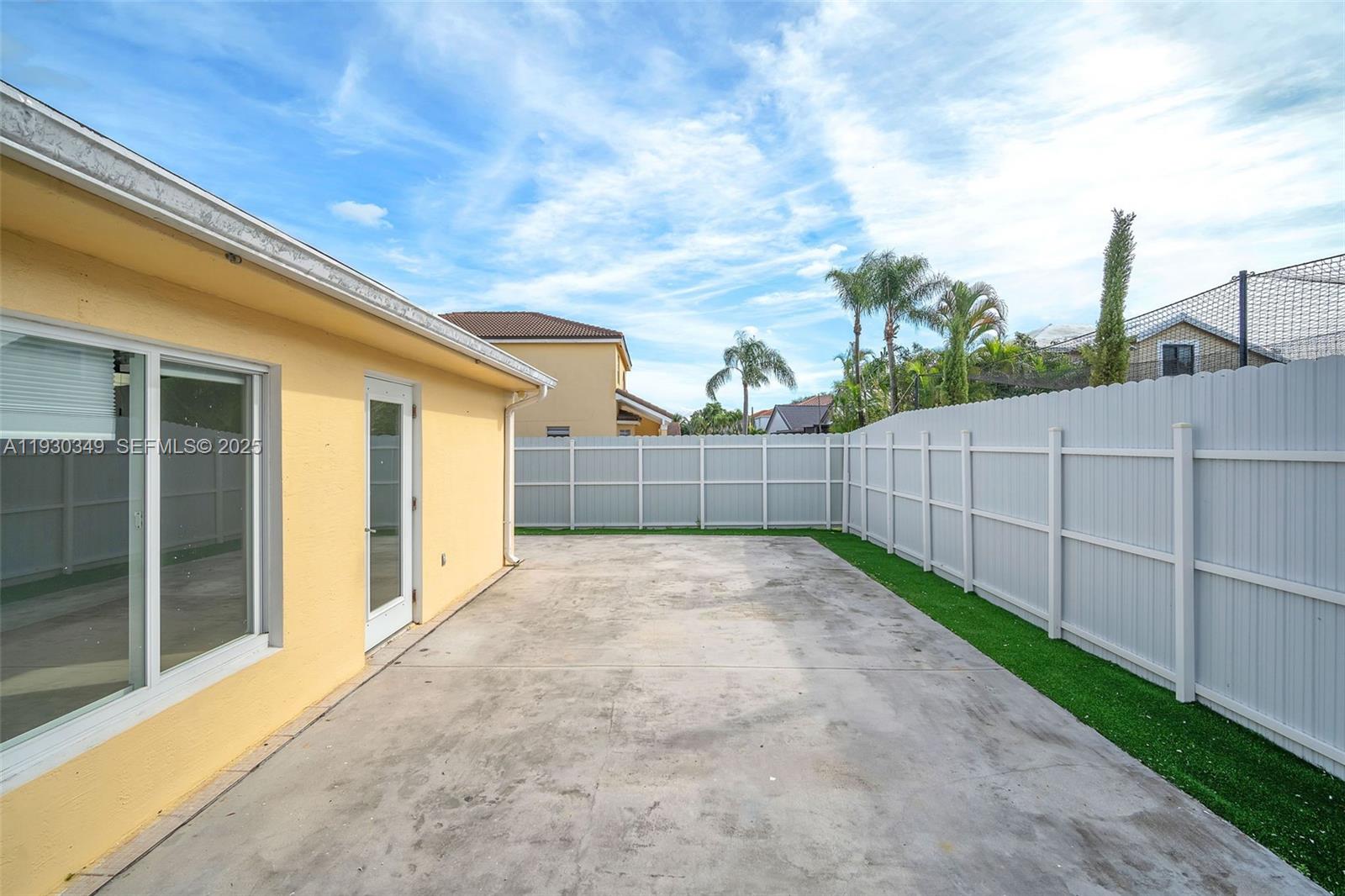 8300 Northwest 201st Street Hialeah, FL 33015 - Photo 24 of 33 a view of a backyard