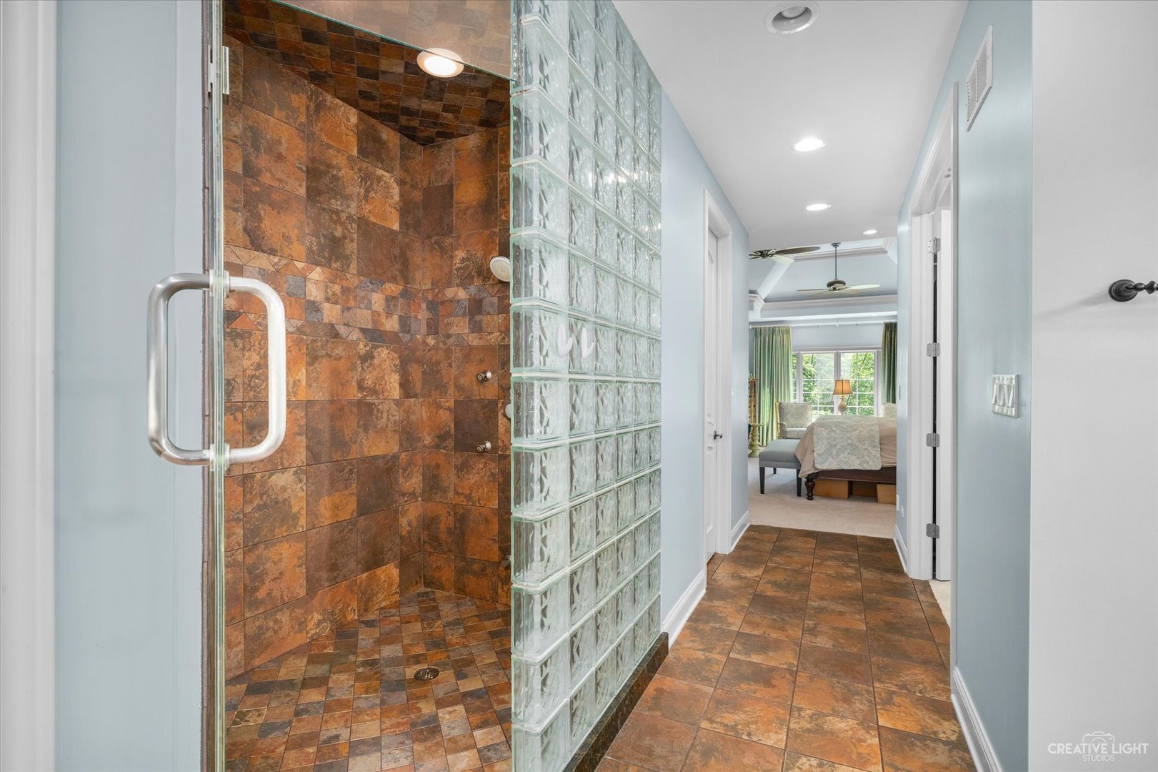 521 Chatfield Road New Lenox, IL 60451 - Photo 29 of 48 a bathroom with a glass shower door