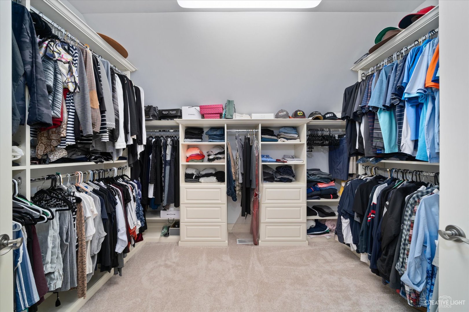 521 Chatfield Road New Lenox, IL 60451 - Photo 30 of 48 a view of walk in closet with clothes and shoes