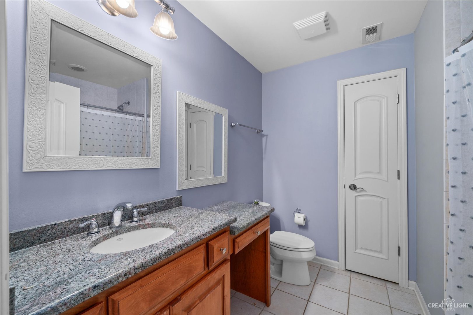 521 Chatfield Road New Lenox, IL 60451 - Photo 32 of 48 a bathroom with a granite countertop sink toilet and shower