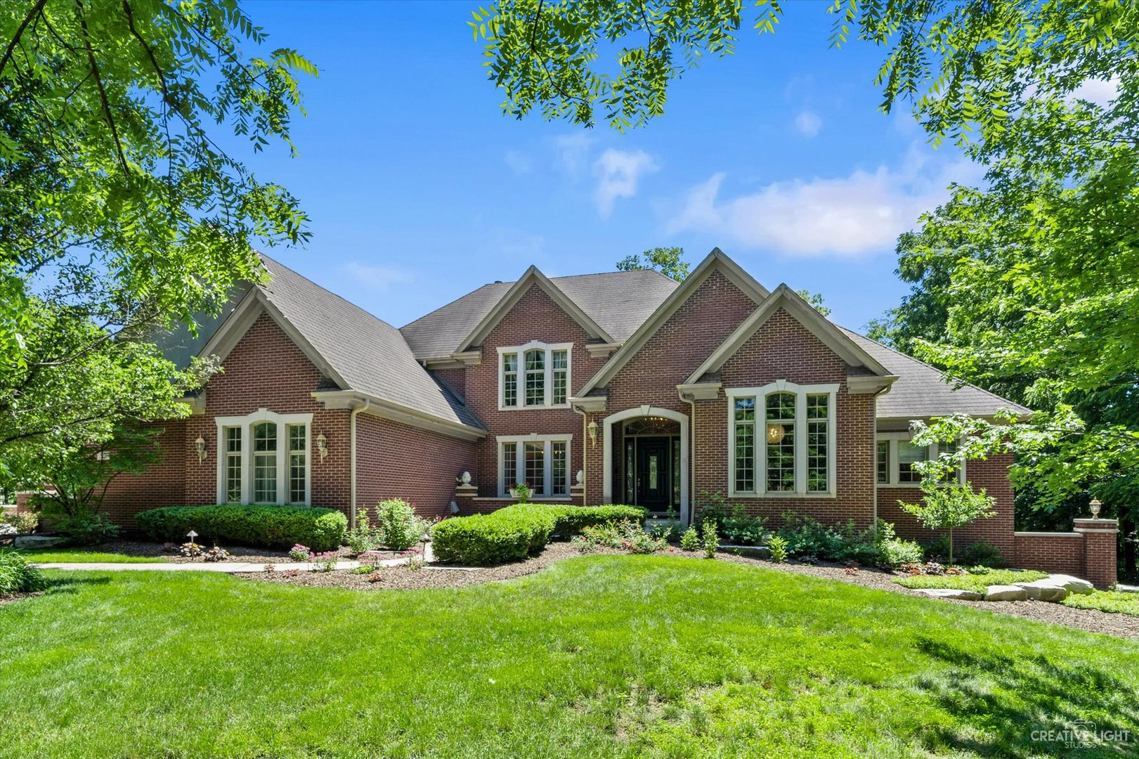521 Chatfield Road New Lenox, IL 60451 - Photo 8 of 48 a front view of a house with a yard