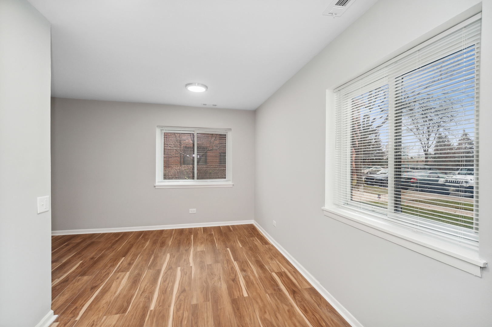 1779 West Algonquin Road, Unit 1A Mount Prospect, IL 60056 - Photo 9 of 15 a view of a room that has a window in it