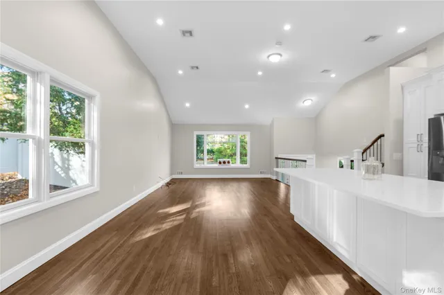a stove top oven sitting inside of a kitchen