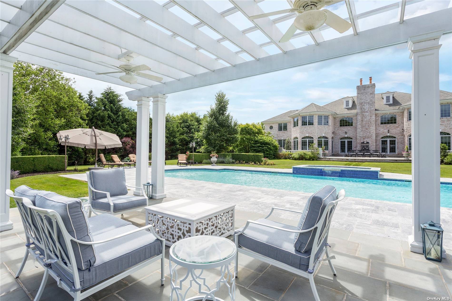 a view of an chairs and tables in the patio