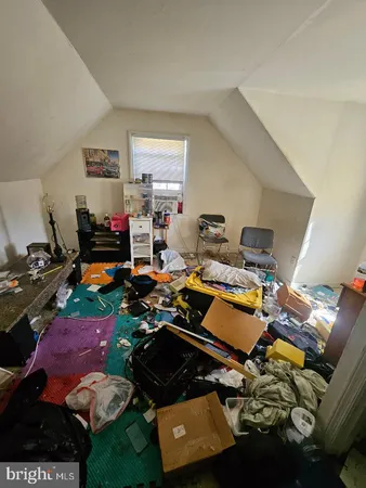 a room with furniture and a wooden floor