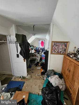a room with furniture and a window