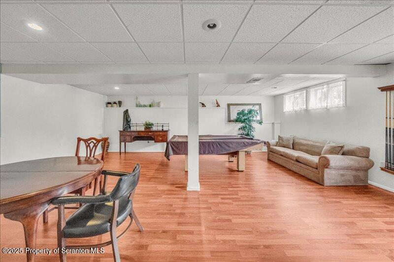 3886 Bow Bridge Road Friendsville, PA 18818 - Photo 41 of 71 a living room with furniture and wooden floor