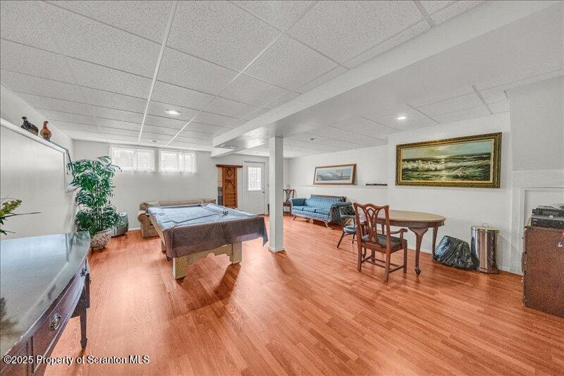 3886 Bow Bridge Road Friendsville, PA 18818 - Photo 42 of 71 a living room with furniture and wooden floor