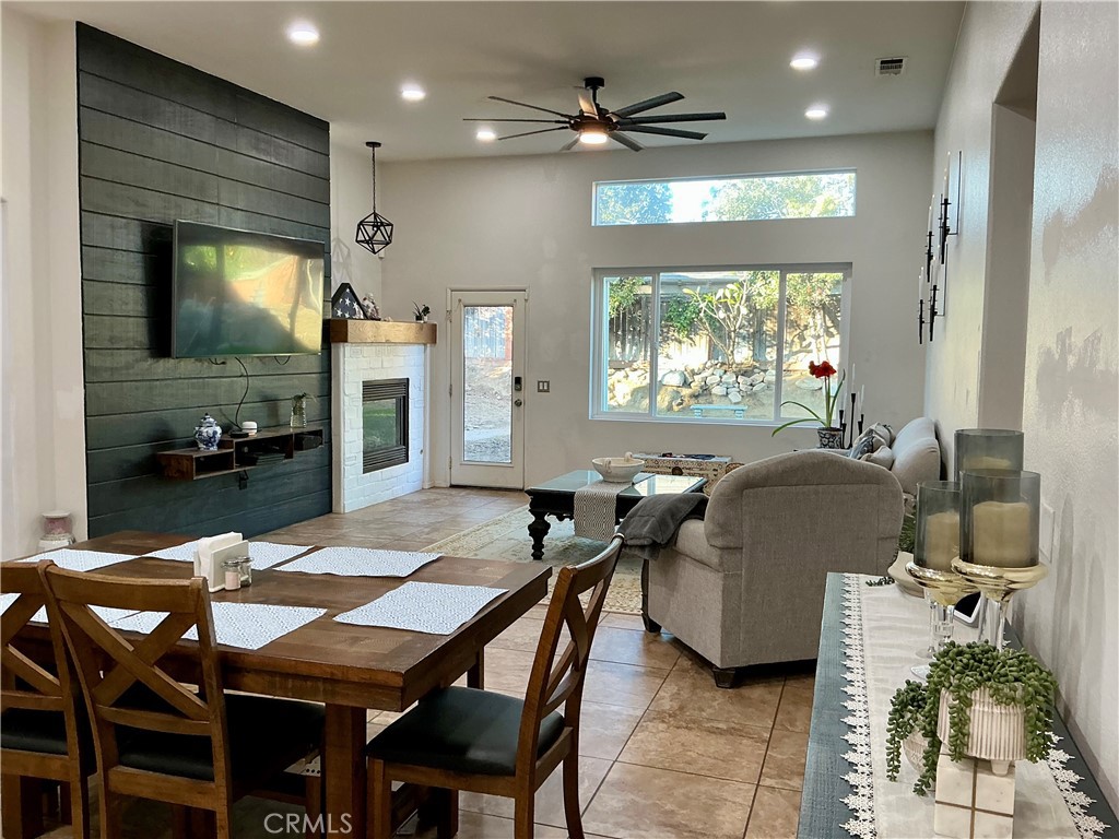 12644 Avocado Way Riverside, CA 92503 - Photo 4 of 6 a view of a dining room with furniture window and outside view
