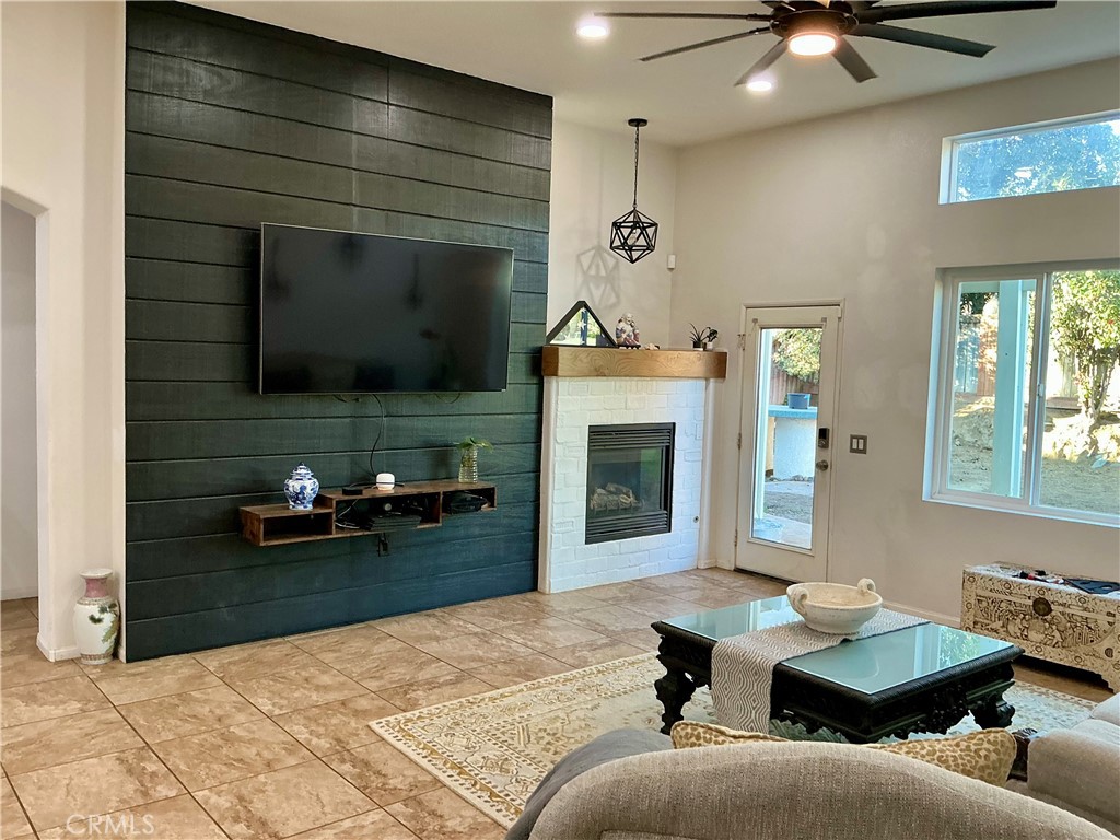 12644 Avocado Way Riverside, CA 92503 - Photo 5 of 6 a living room with furniture and a fireplace