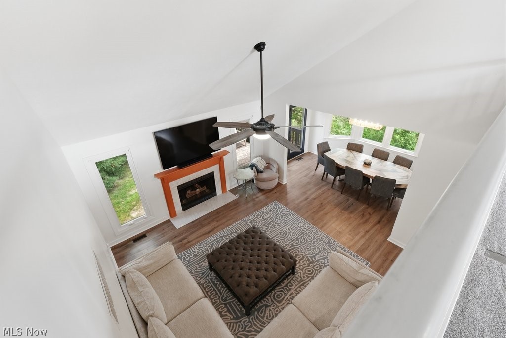 2323 Call Road Stow, OH 44224 - Photo 8 of 42 View from loft area-Vaulted ceilings enhance this open-concept space featuring wood-finish flooring