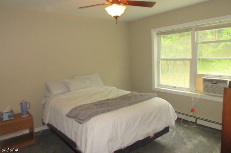 28 Beaver Run Road Lafayette, NJ 07848 - Photo 22 of 36 a bedroom with a bed and a window